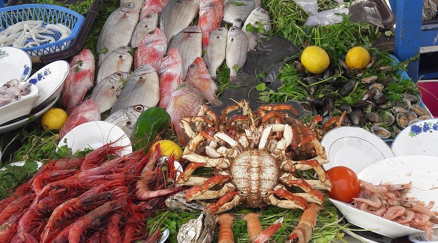 Essaouira Day Trip from Marrakech: The Complete 2026 Guide fresh seafood fish market Essaouira fishing port day trip from Marrakech lunch